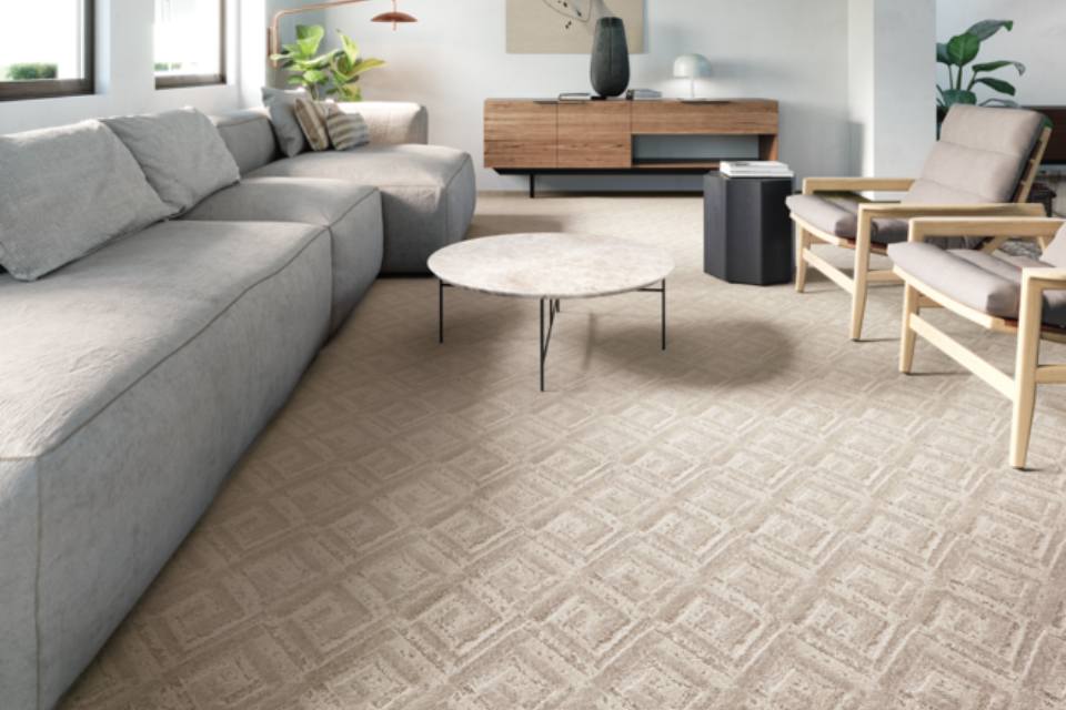 beige patterned carpet in midcentury modern living room.